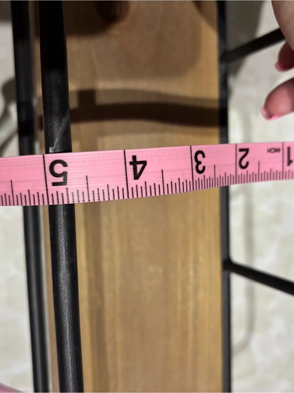 Rustic Black Metal Wall Shelf with Hooks and Wood Accent